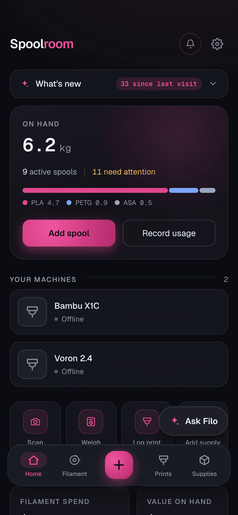 The Spoolroom dashboard on a phone: total filament on hand, spools that need attention, and the tab bar with the Ask Filo button floating above it.